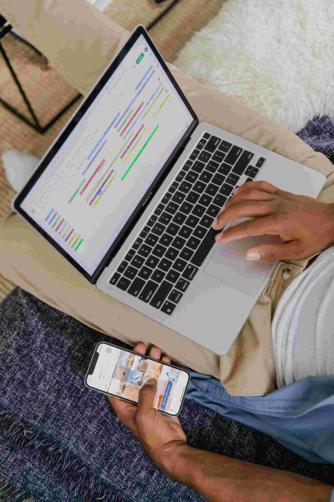 an automation professional working on a laptop